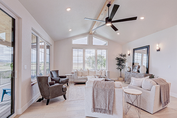 A home remodel budget should support your home's look and style for many years to come like this classic looking great room with clean lines, big windowa and adaptable styling.